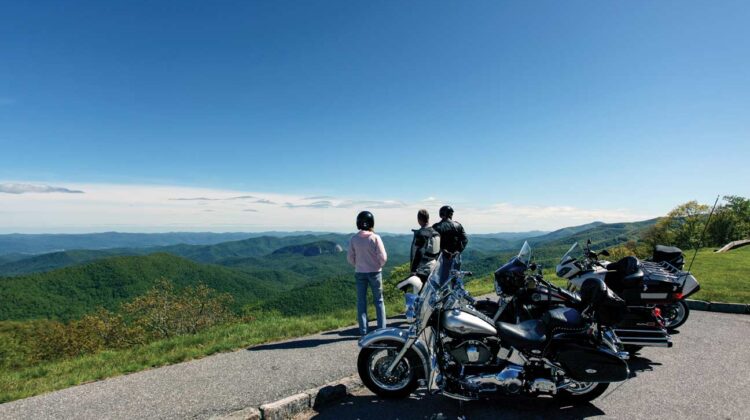 Motorcycle riders take a break at an overlook on the Blue Ridge Parkway