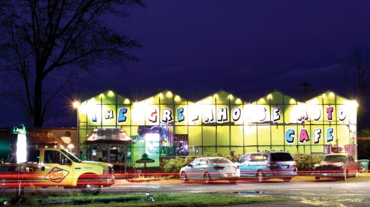 A night view of a brightly-colored building