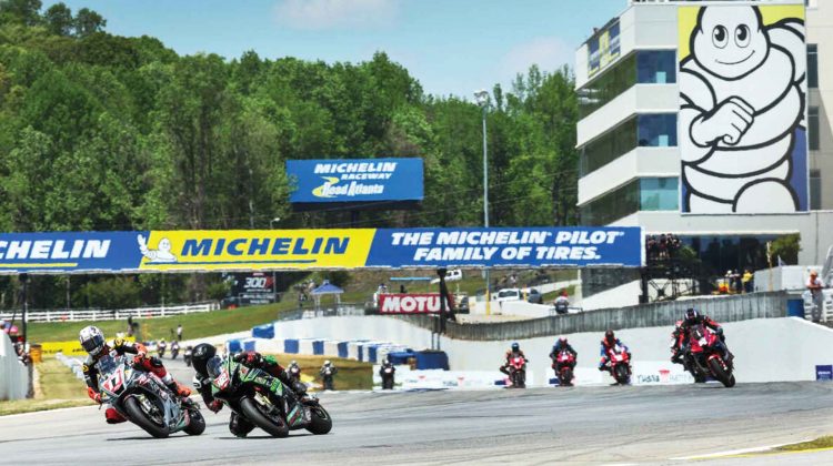 Riders race around the track at Road Atlanta