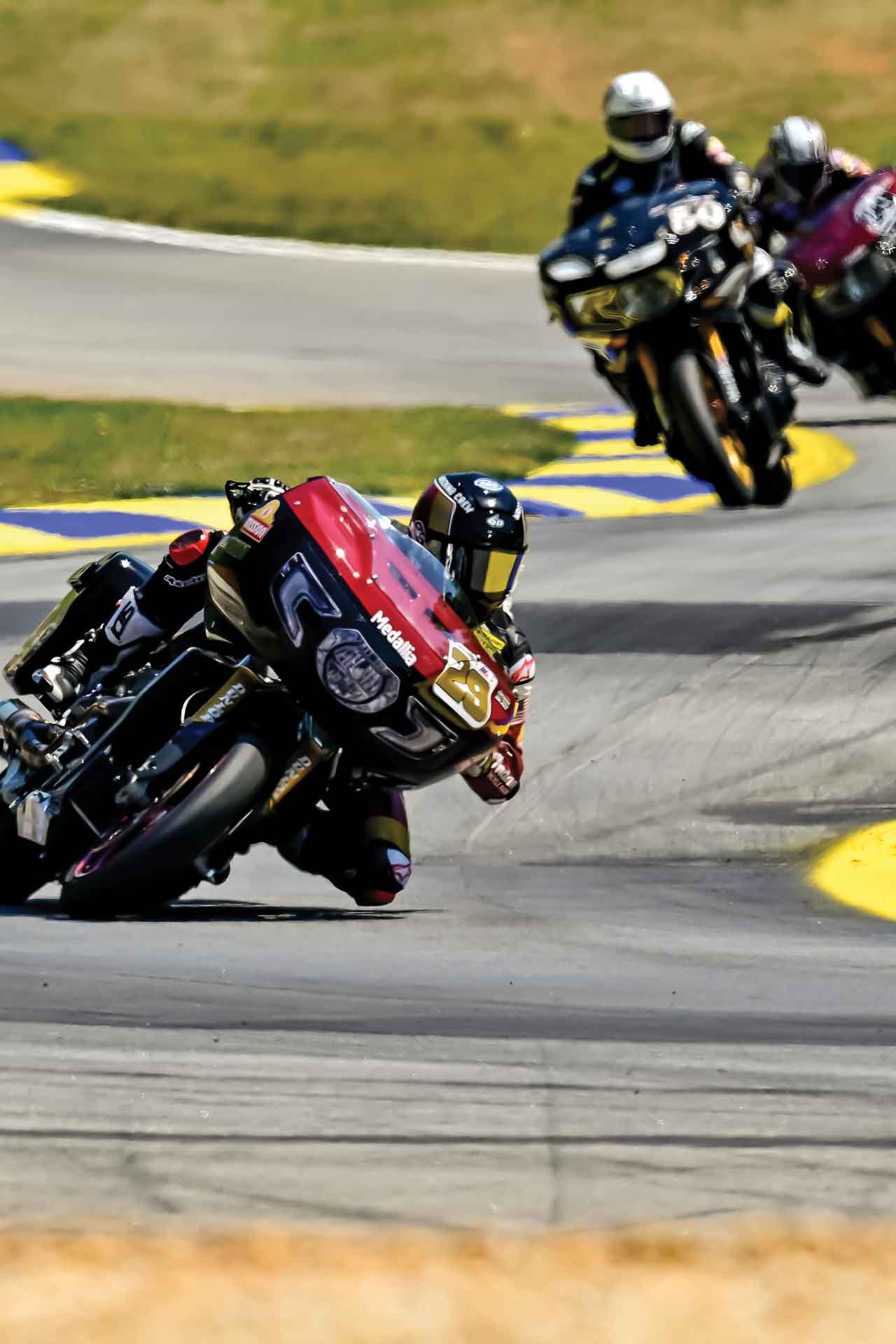 Riders race around the track at Road Atlanta.